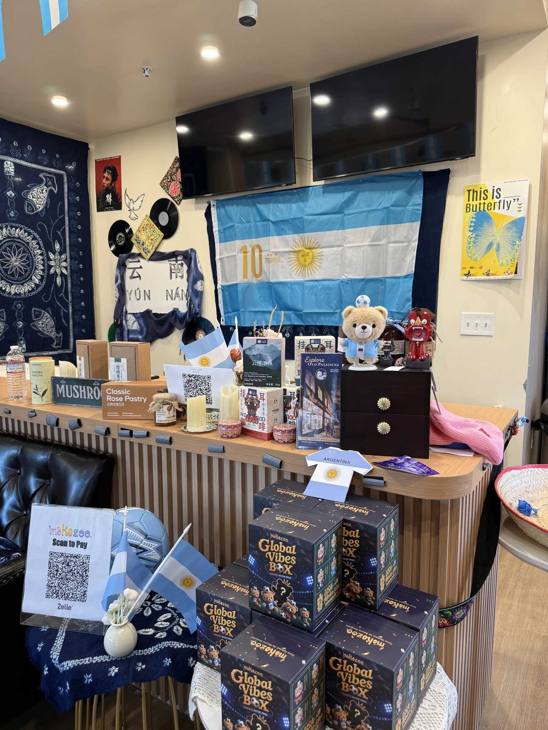 Mokozoo Global Vibes Box display inside Unicorn Coffee