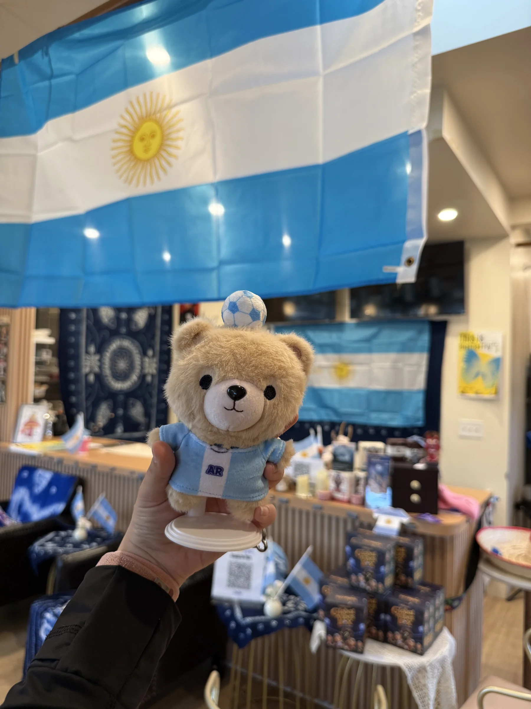 Mokozoo plush bear featured at Unicorn Coffee display counter